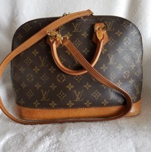 PM size Authentic Alma monogram with strap